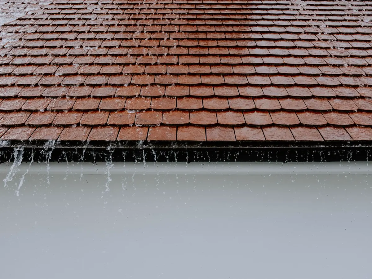 Residential roof during heavy Florida rain